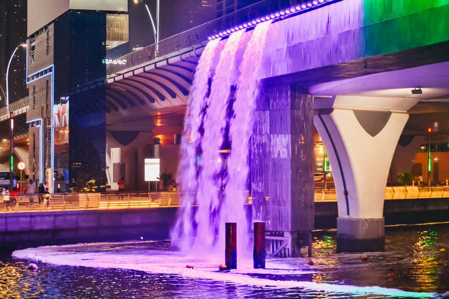 Dubai: Water Canal Cruise and La Perle Show with Dinner - Dinner while the city lights come on