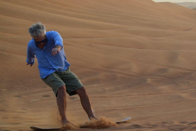 Dune Bashing with Quad Bike and Sand Boarding from Dubai - Thirty minutes of dunes, ridges, and dusty tracks