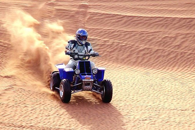 Dune Bashing with Quad Bike and Sand Boarding from Dubai - Sand boarding adds a second kind of fun