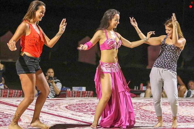 Evening Abu Dhabi Desert Safari & BBQ Dinner- Standard Tour - Sandboarding and short camel riding