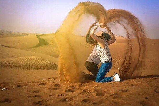 Evening Desert Safari Dubai with BBQ Dinner (Pick Up By Bus) - The Bedouin-style camp after dark