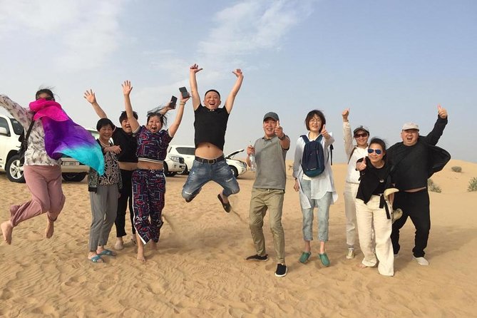 Evening Desert Safari Dubai with BBQ Dinner (Pick Up By Bus) - Dune bashing and sunset photos