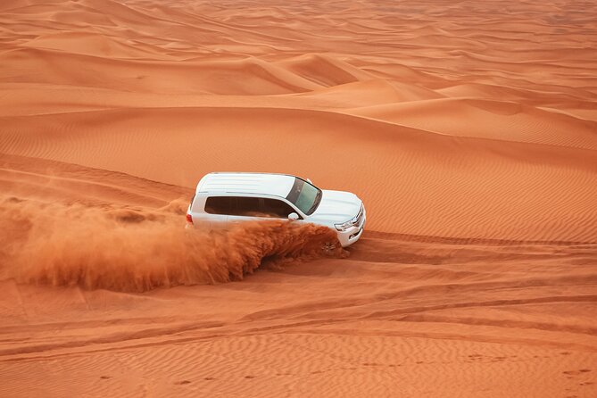 Evening Desert Safari in Dubai - Camel riding and sandboarding