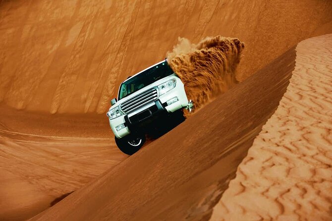 Evening Desert Safari with Belly Dance and BBQ Dinner and Camel Ride - Dubai’s Desert Begins With a 3 p.m. Pickup