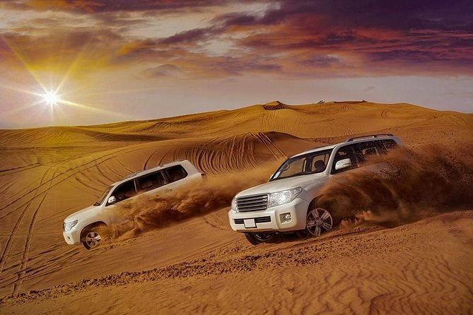 Evening Desert Safari with Belly Dance and BBQ Dinner and Camel Ride - Sandboarding and a Short Camel Ride