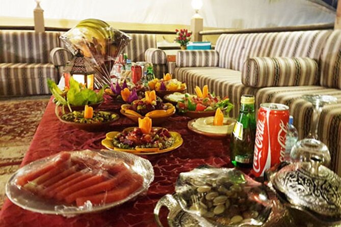 Evening desert safari with camel ride and BBQ dinner - Air-conditioned pickup, long transfers, and uneven timing