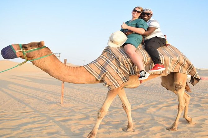 Evening Desert Safari with, Dune Bashing, Camel Ride, sand board - Camel riding and a slower look at the sand