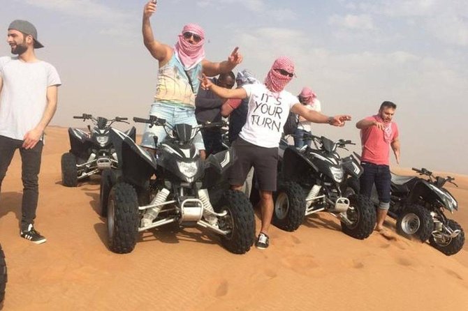 Evening Red Dunes Safari with Quad Biking, BBQ Dinner & LiveShows - Dune bashing on the tall red dunes