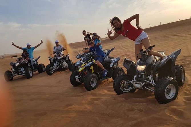 Evening Red Dunes Safari with Quad Biking, BBQ Dinner & LiveShows - Quad biking across the designated Lahbab riding area