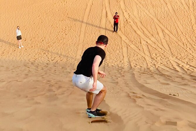 Exclusive Desert safari - Sand boarding and the brief camel ride