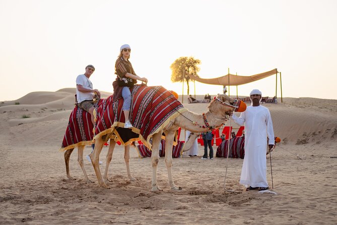 Experience Red Dune Safari Shows, Camels, BBQ & ATV Bike in Dubai - Quad biking across Dubai’s red sand