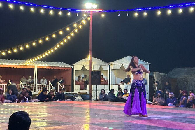 Experience the Ultimate Dubai Red Dunes Desert Safari BBQ Dinner - Belly dance, Tanoura, and the fire show