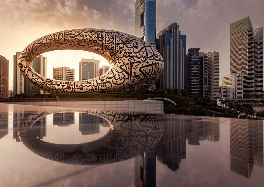From Abu Dhabi: Dubai City Tour with Creek, Abra & Old Souks - Crossing Dubai Creek in a traditional abra