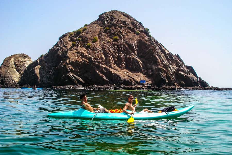 Fujairah: Snorkeling and Watersports at Snoopy Island - Snoopy Island with the Hajar Mountains behind you