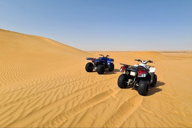 Guided Desert Safari with Dinner and Quad Biking in Dubai - Dune bashing across the high red sand