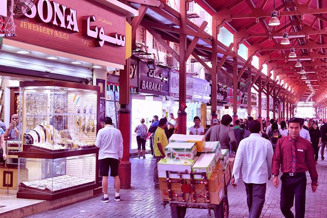 Half-Day Dubai City Tour with Blue Mosque, Creek, Souks & Abra - Crossing Dubai Creek by abra