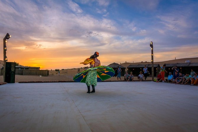 Half-Day Dubai Desert Safari With 7 Live Shows and BBQ Dinner - BBQ dinner and the camp crowd