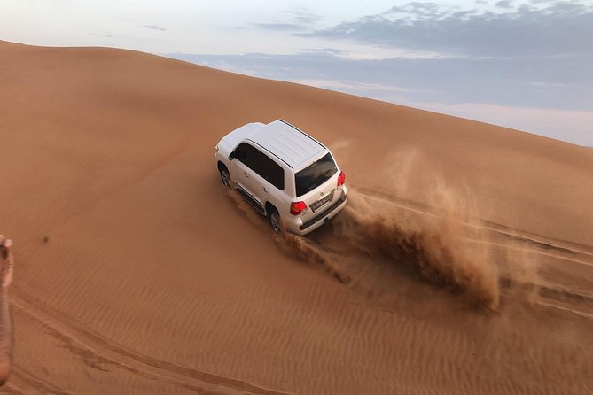 Half-Day Evening Desert Safari in Dubai with BBQ Dinner - Leaving Dubai in an Air-Conditioned 4x4