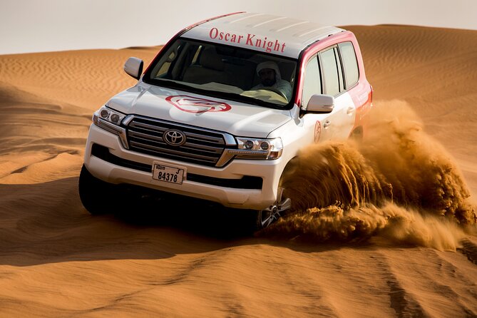 High Red Dunes with Camel Ride, Sandboarding, Falcon Show and VIP BBQ Dinner - Why Lahbab’s red dunes make this safari special