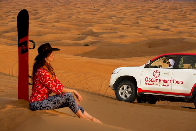 High Red Dunes with Camel Ride, Sandboarding, Falcon Show and VIP BBQ Dinner - Pickup from Dubai and the first desert stop