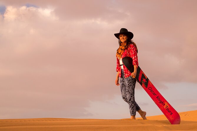 High Red Dunes with Camel Ride, Sandboarding, Falcon Show and VIP BBQ Dinner - What the $80 price really covers
