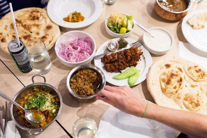 Local Street Food and Guided Walking Tour of Dubai Old Town - Bargaining through the Textile Souk