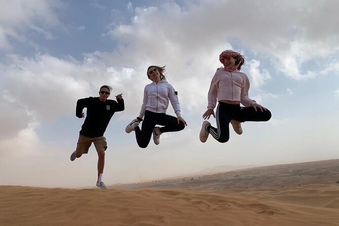 Morning Desert Safari, Quad Bike, Sandboard and Camel Ride - Sandboarding: fun, simple, and not guaranteed to impress everyone
