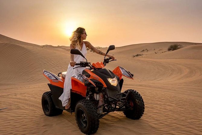 Morning Desert Safari with Quad Bike, Camel Ride & Sandboarding - Sandboarding with an instructor