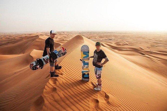 Morning Desert Safari with Quad Bike, Camel Ride & Sandboarding - Pickup, transport, and the ride to Lahbab