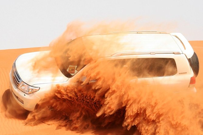 Morning Dubai Red Dunes Safari with Camel Riding & Sand Boarding - Sandboarding gives you an easy desert challenge