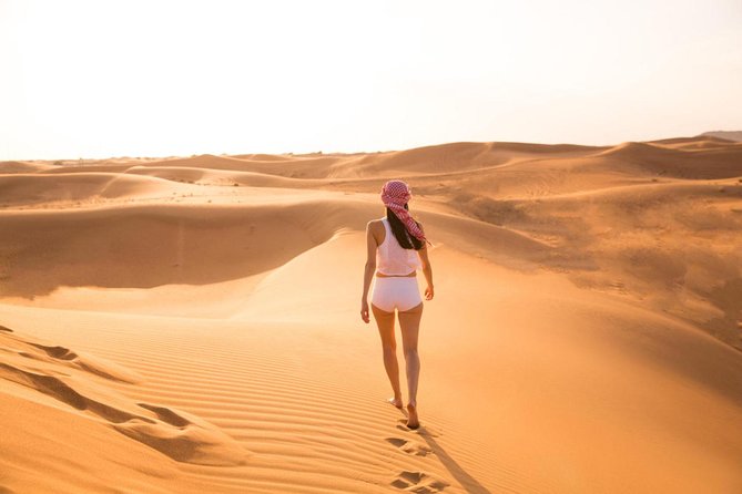 Morning Red Dunes Safari: Camel Ride & Sandboarding Adventure - Why the red dunes make this morning special