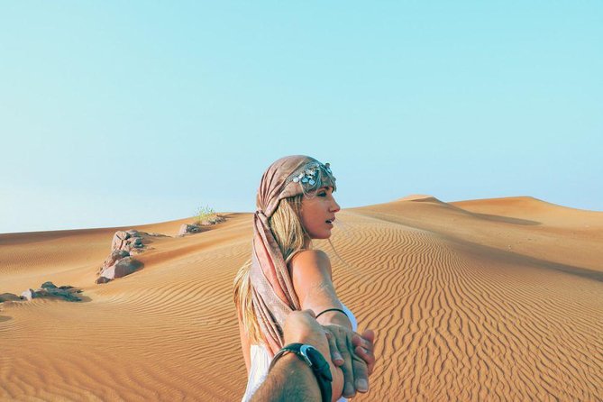 Morning Red Dunes Safari: Camel Ride & Sandboarding Adventure - The photo stop is short but worthwhile
