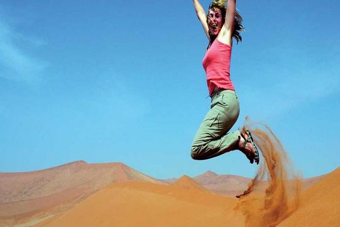 Morning Red Dunes Safari: Camel Ride & Sandboarding Adventure - The camel ride is traditional, but brief