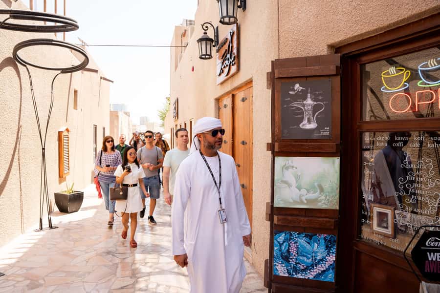 Old Dubai Historic Guided Tour: Creek, Street Food & Souks - Arabic coffee and dates inside a heritage house