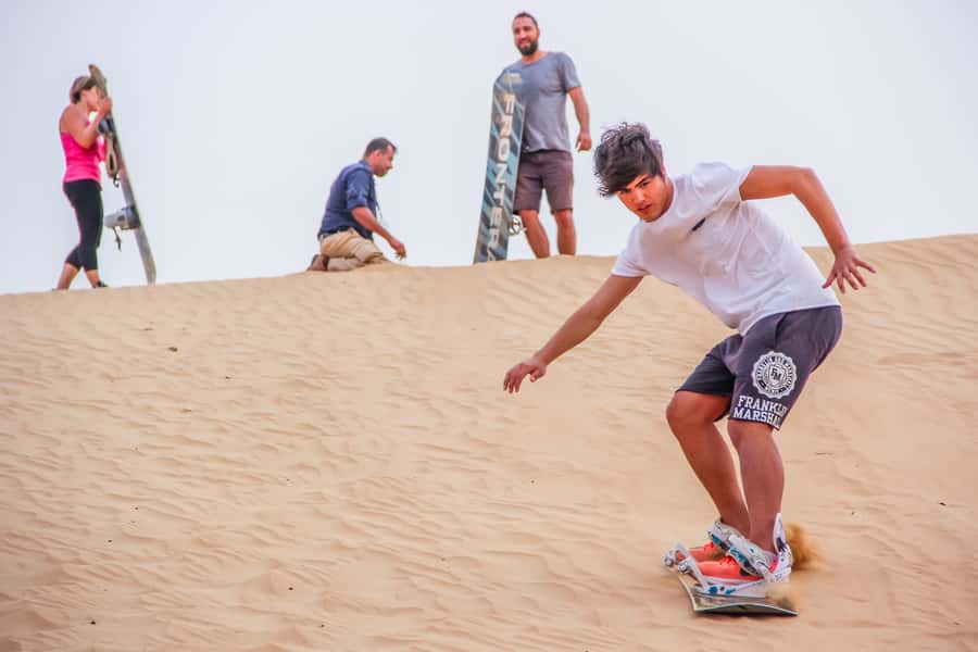 Overnight Dubai Desert Safari with BBQ Dinner - Sandboarding and the short camel ride