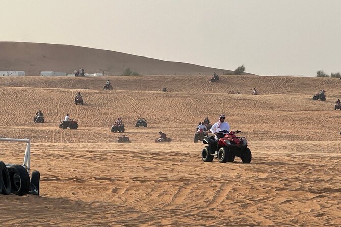 Premium Desert Safari Activities for Group and Family - Sandboarding and the sunset photography stop