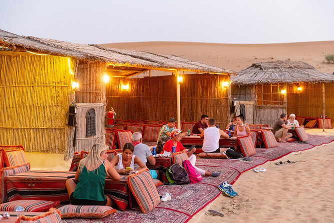 Premium Dubai Desert Safari with BBQ Dinner in the Red Dunes - Meeting camels at Lahbab
