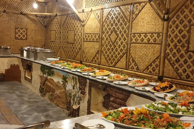 Premium Red Dunes Safari | Camel Ride | Dune Bashing | Sand Ski - Sunset photographs in traditional clothing