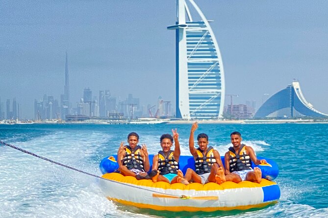 Private 60-min Group Tubing on Speedboat in Dubai - Taking turns on the two-person tube