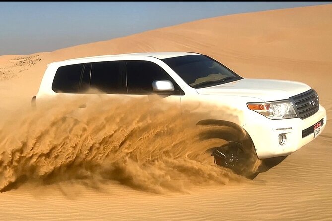 Private Abu Dhabi Sunset Desert Safari with Sand Boarding - Dune bashing across Al Khatim Desert