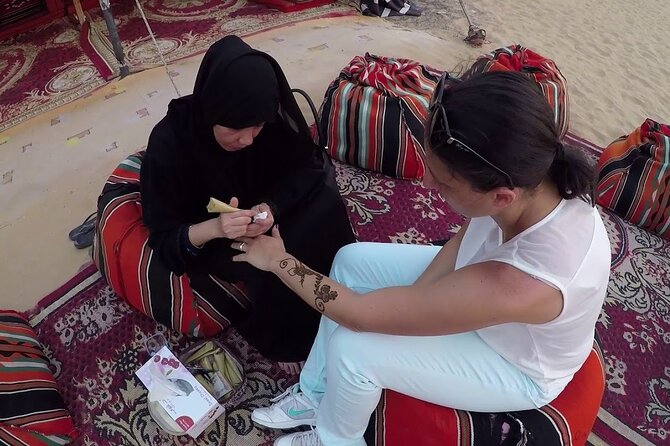 Private Adventure Red Dune Desert Safari With BBQ Dinner & Shows - Sandboarding adds a simple second challenge