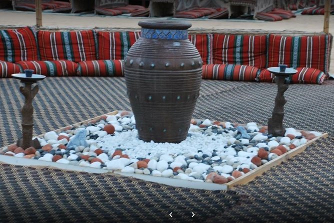 Private Desert Safari Red Dune with BBQ, Sand Boarding and Camel Ride - What dinner at the desert camp includes