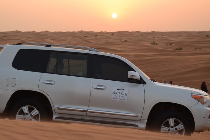 Private Desert Safari Red Dune with BBQ, Sand Boarding and Camel Ride - Hotel pickup makes this a simple evening plan