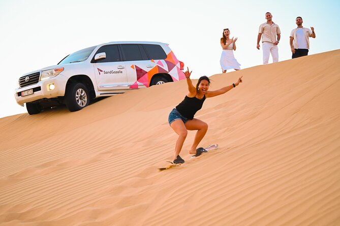 Private Dune Bashing in Abu Dhabi - Morning Desert Safari - Camel Ride, Camel Farm, and Sandboarding