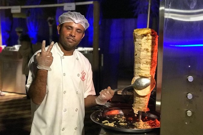 Private Evening Desert Safari Dubai with Hot BBQ Dinner - The shared Bedouin-style camp after dark