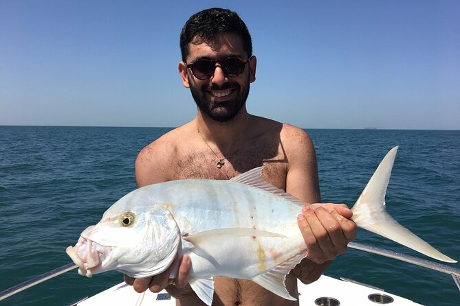 Private Regular Fishing Trip in Dubai - Snacks, drinks, and the simple onboard setup