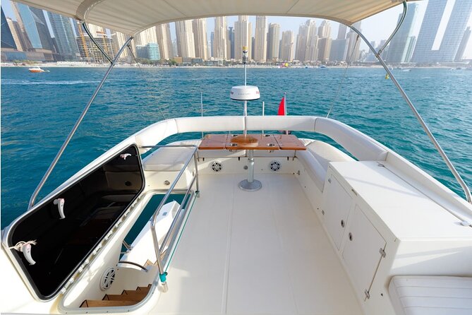 Private Yacht Cruising Rental from Dubai Marina - Deck time, salon comfort, and music