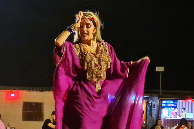Professional Desert Safari with Camel Ride & BBQ in Bedouin Camp - Sandboarding and sunset photos