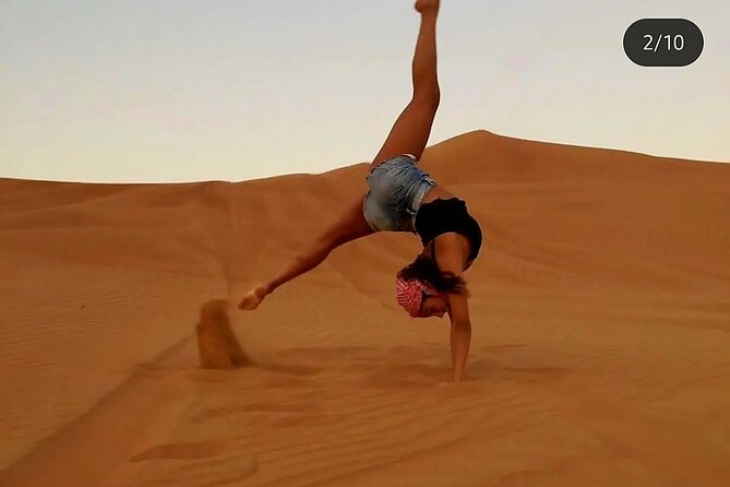 Quad Bike Dubai Desert Safari with BBQ Dinner Sandboard and Show - Four hours at the Al Aweer desert camp