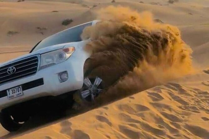 Quad Bike Dubai Desert Safari with BBQ Dinner Sandboard and Show - Quad biking at Lahbab